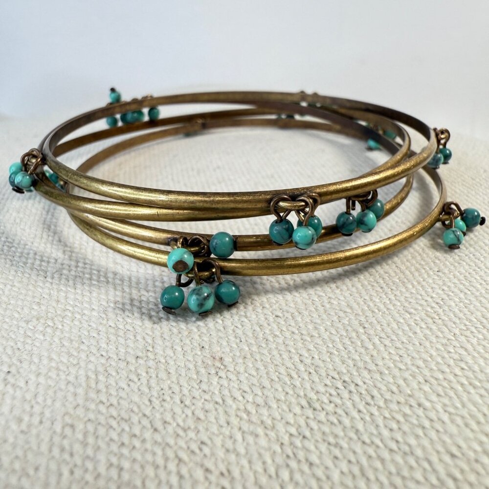 Set Of 4 Antique Gold‎ Tone Bangles With Turquoise Beaded Charms Layering